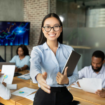 HR Manager Giving Hand For Handshake At Camera During Corporate Meeting